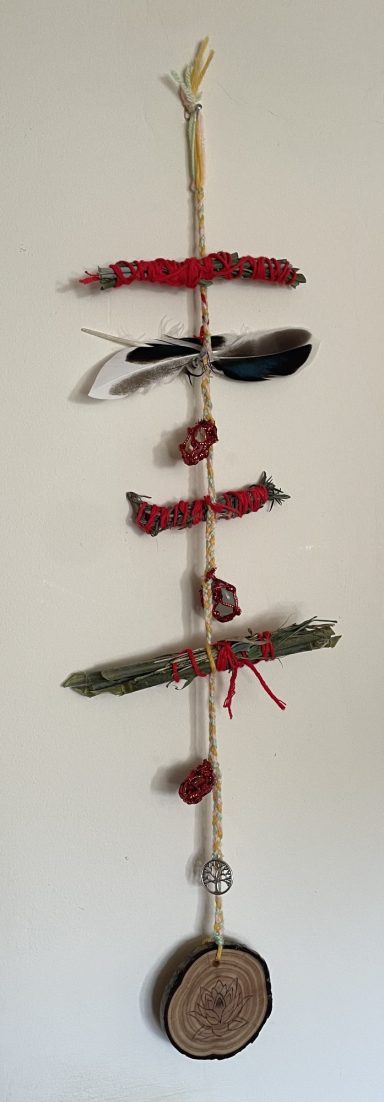 A witch’s ladder made for balance harmony and prosperity